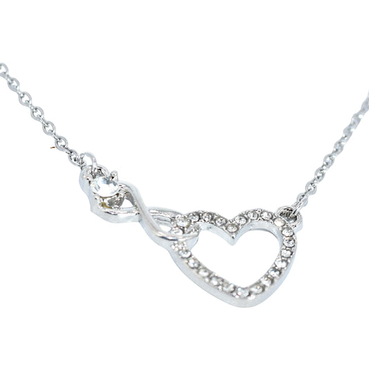 Collana argento, collana cuore, un cuore ricoperto di strass, collana simbolo dell’infinito, regalo prezioso, un gioiello che incanta.